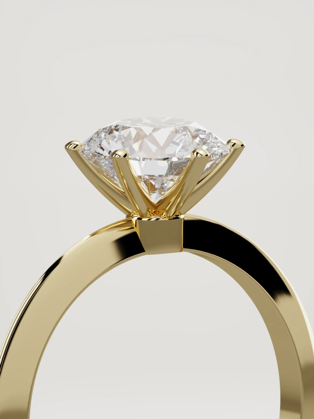 The Prisma round lab-grown diamond solitaire in 14K yellow gold, standing three-quarter view
