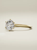 The Prisma round lab-grown diamond solitaire in 14K yellow gold, three-quarter view