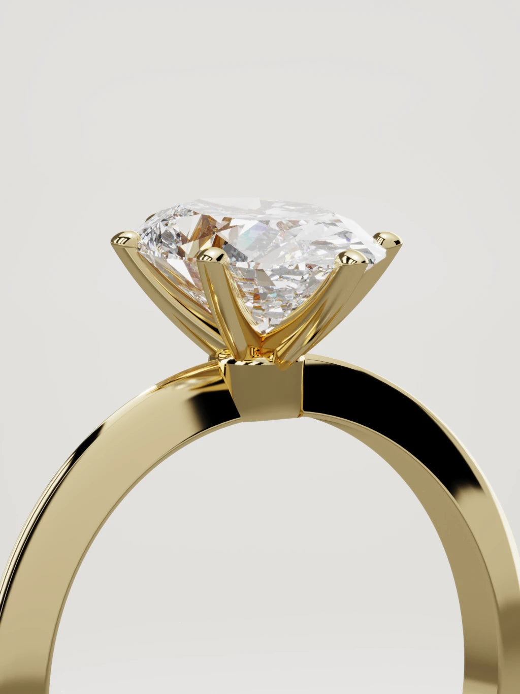 The Prisma oval lab-grown diamond solitaire in 14K yellow gold, standing three-quarter view