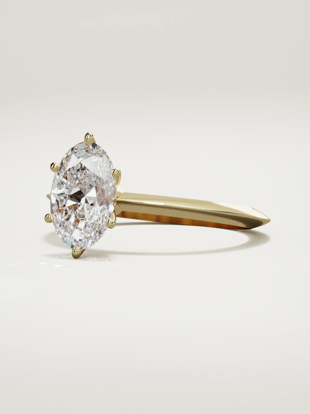 The Prisma oval lab-grown diamond solitaire in 14K yellow gold, three-quarter view