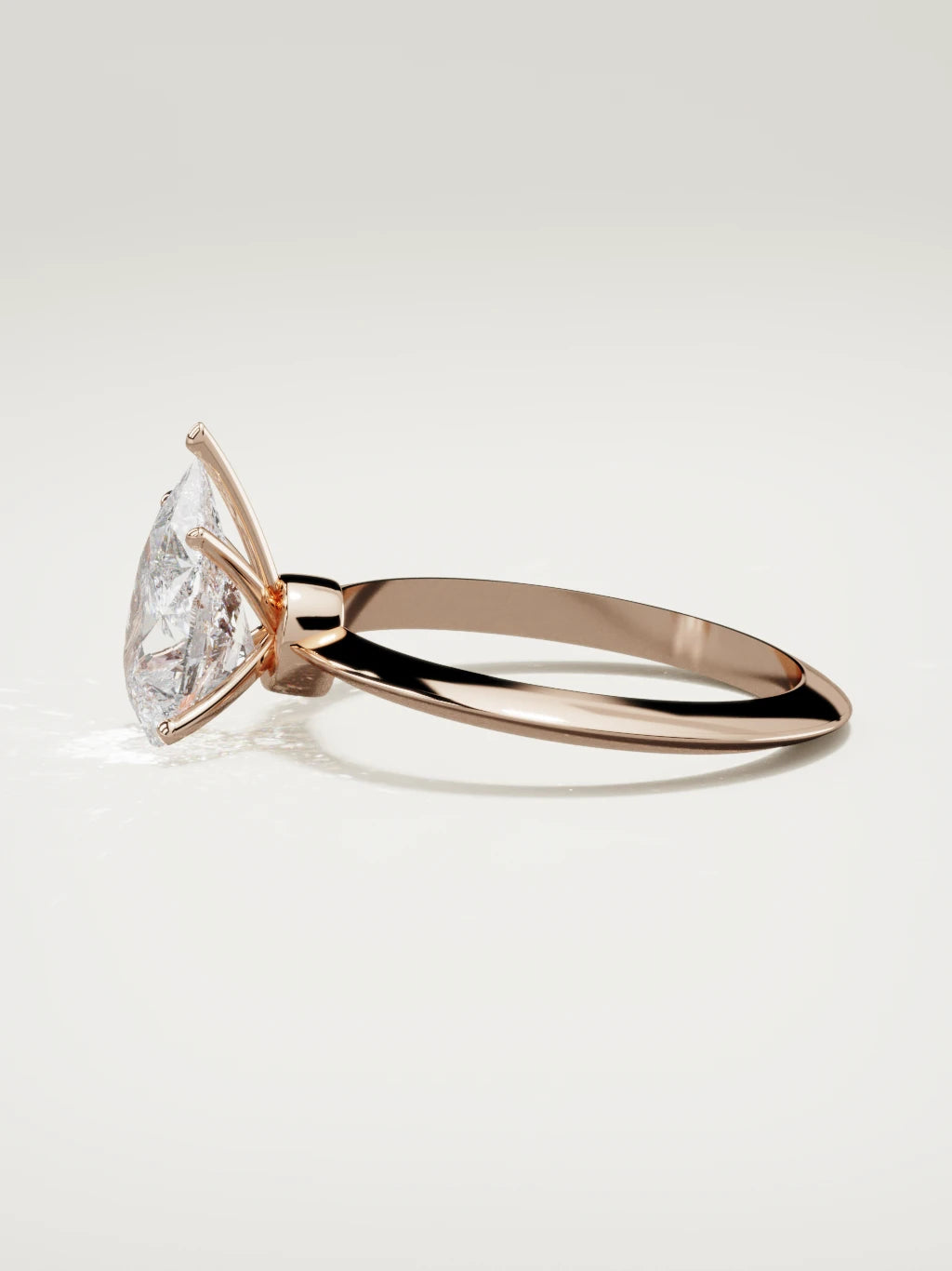 The Prisma pear-shaped lab-grown diamond solitaire in 14K rose gold, side view
