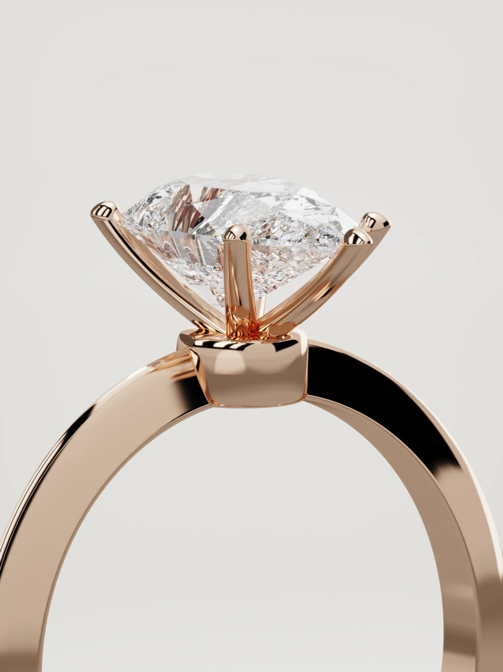 The Prisma pear-shaped lab-grown diamond solitaire in 14K rose gold, standing three-quarter view