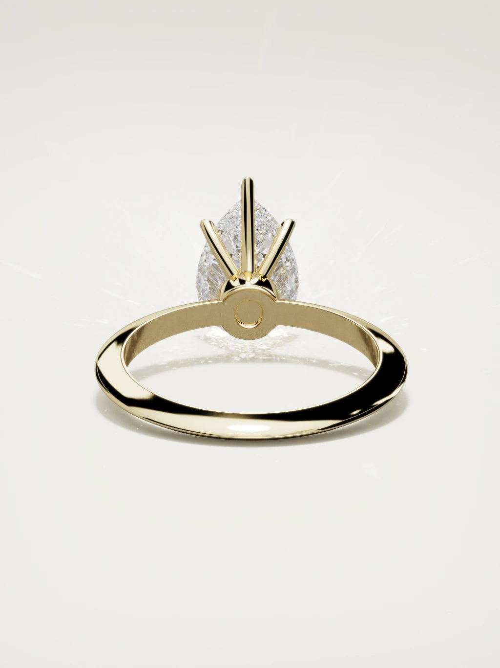 The Prisma pear-shaped lab-grown diamond solitaire in 14K yellow gold, back view