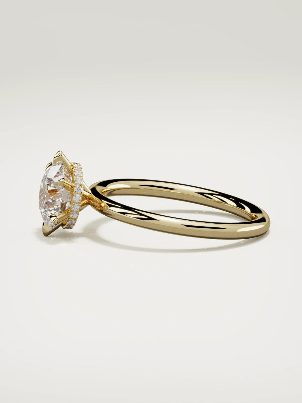 The Velo round lab-grown diamond solitaire in 14K yellow gold, side view