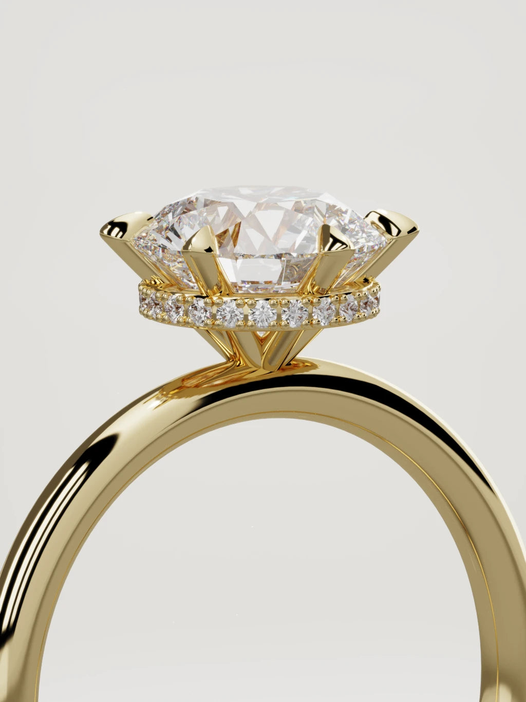The Velo round lab-grown diamond solitaire in 14K yellow gold, standing three-quarter view