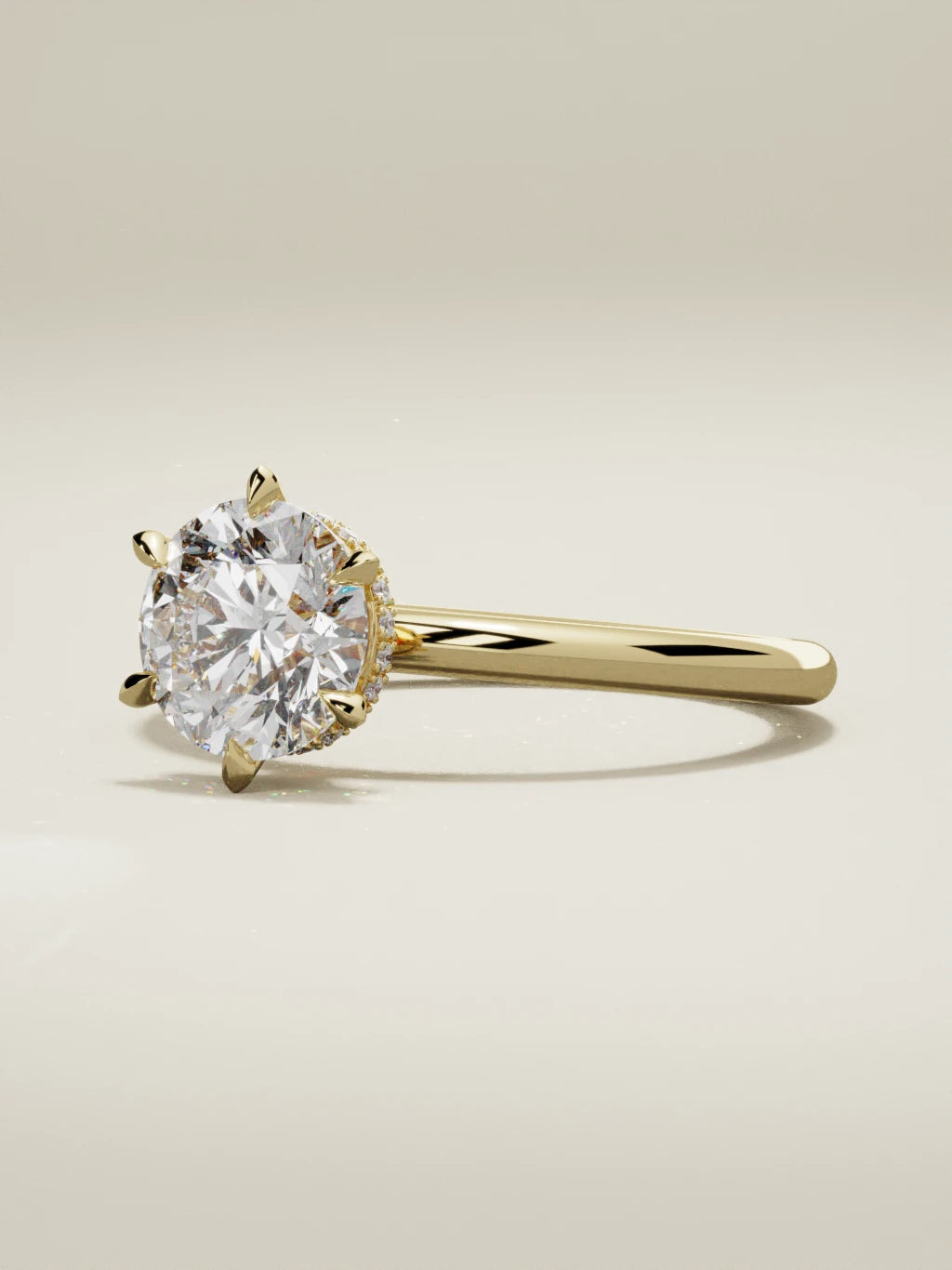 The Velo round lab-grown diamond solitaire in 14K yellow gold, three-quarter view