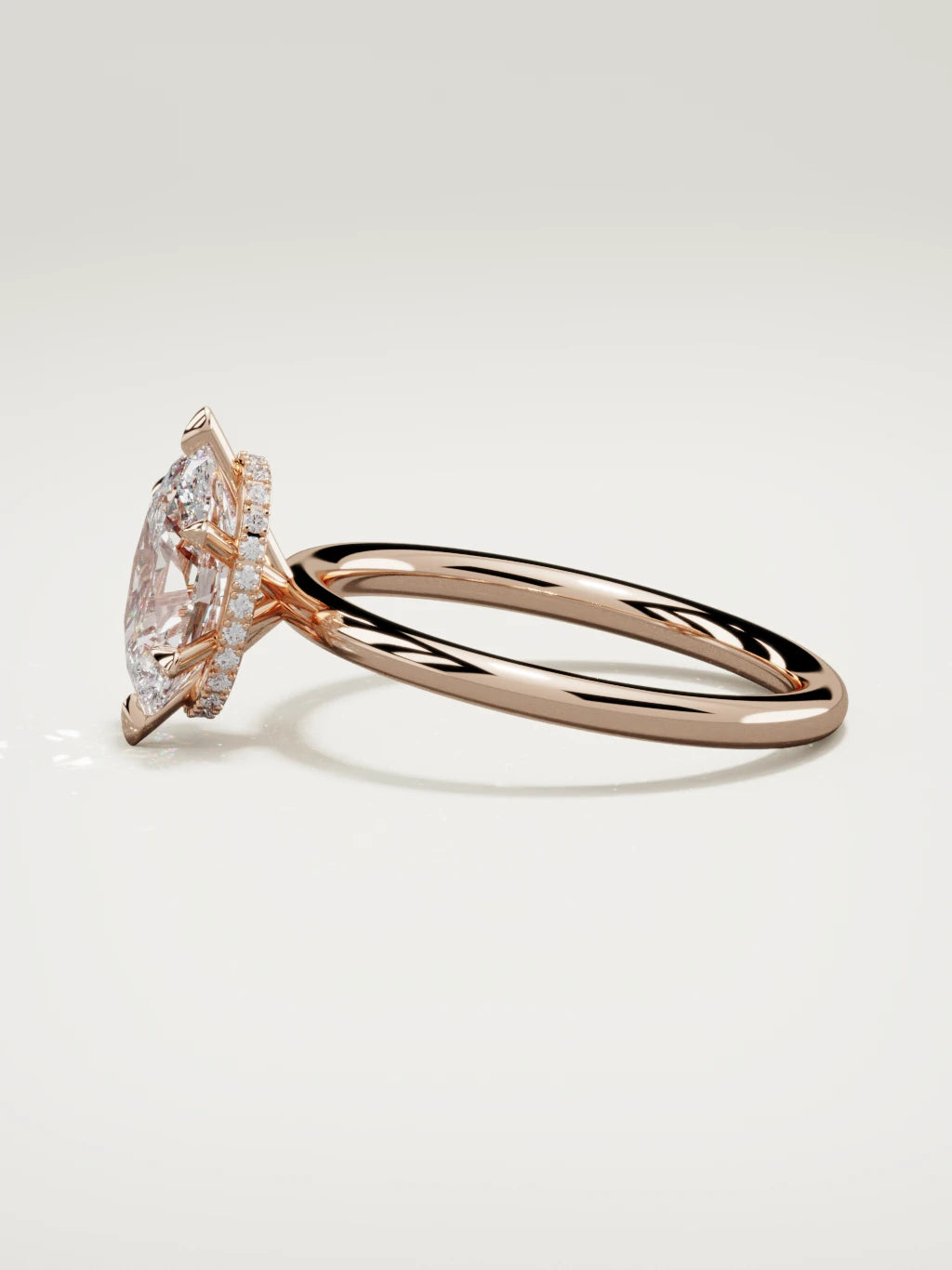 The Velo oval lab-grown diamond solitaire in 14K rose gold, side view