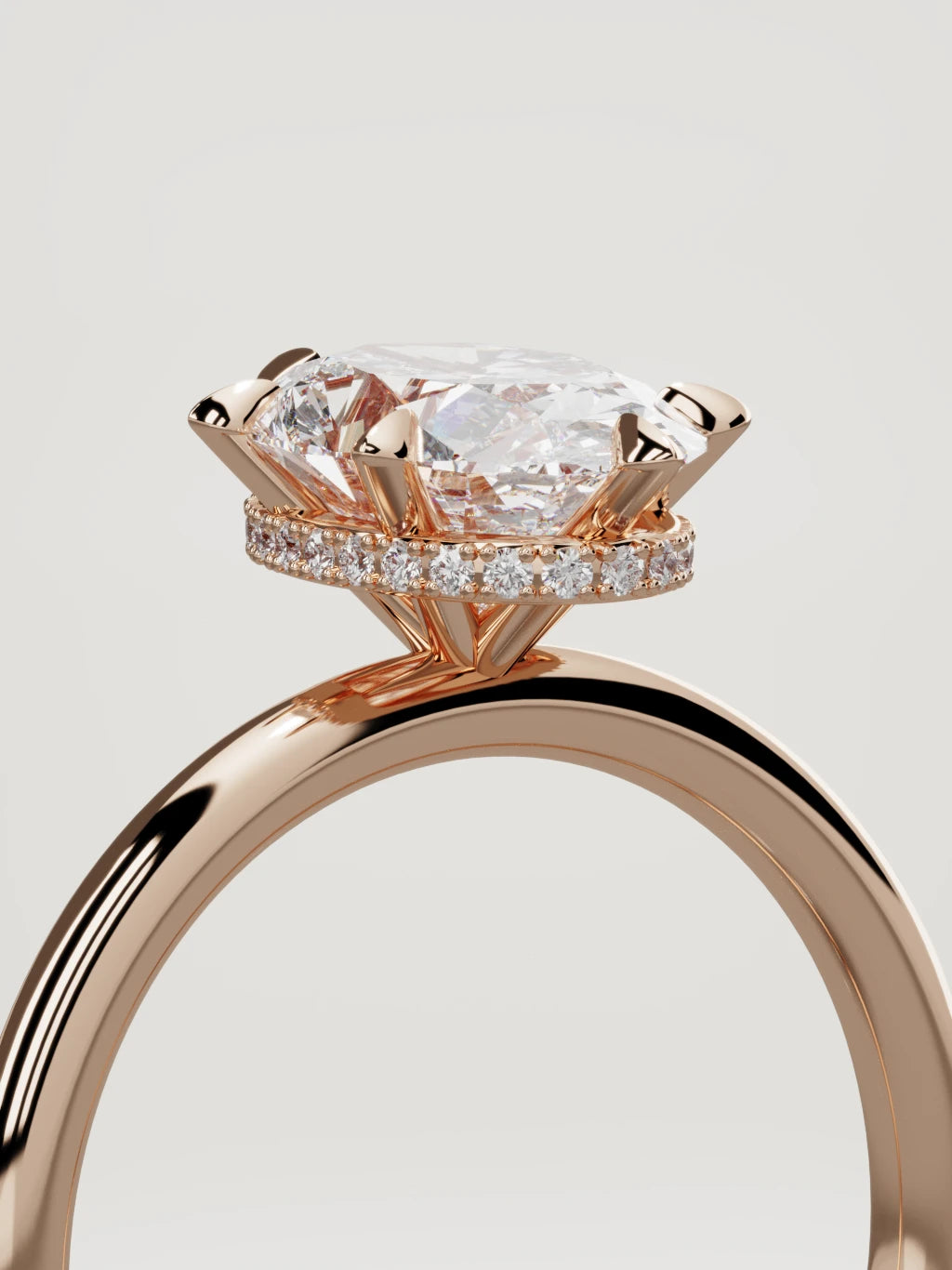 The Velo oval lab-grown diamond solitaire in 14K rose gold, standing three-quarter view