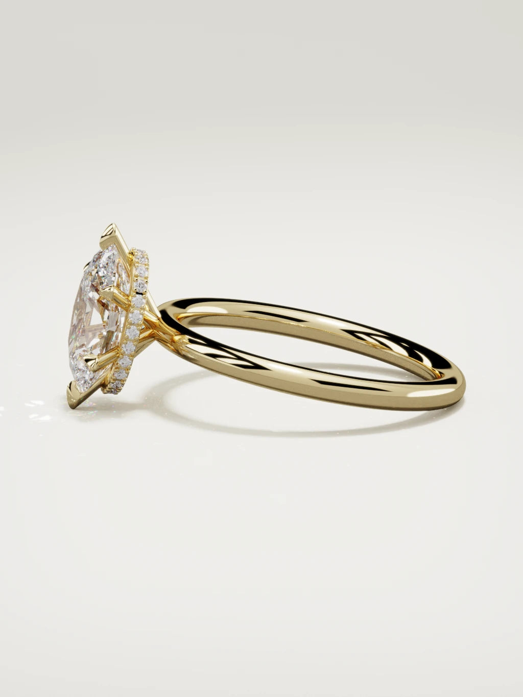 The Velo oval lab-grown diamond solitaire in 14K yellow gold, side view