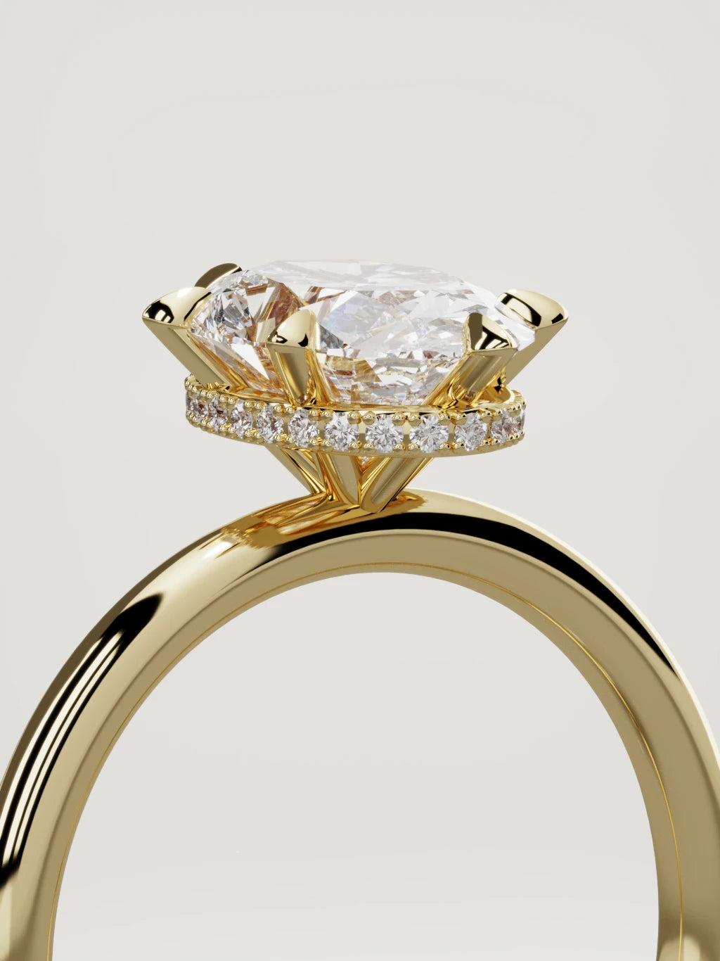 The Velo oval lab-grown diamond solitaire in 14K yellow gold, standing three-quarter view