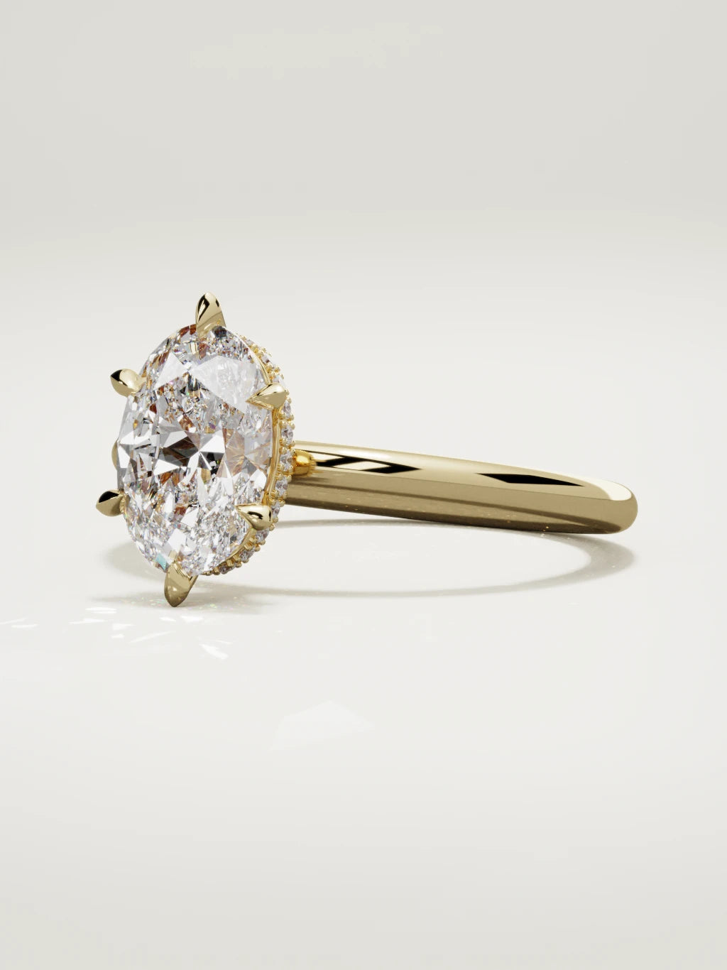 The Velo oval lab-grown diamond solitaire in 14K yellow gold, three-quarter view