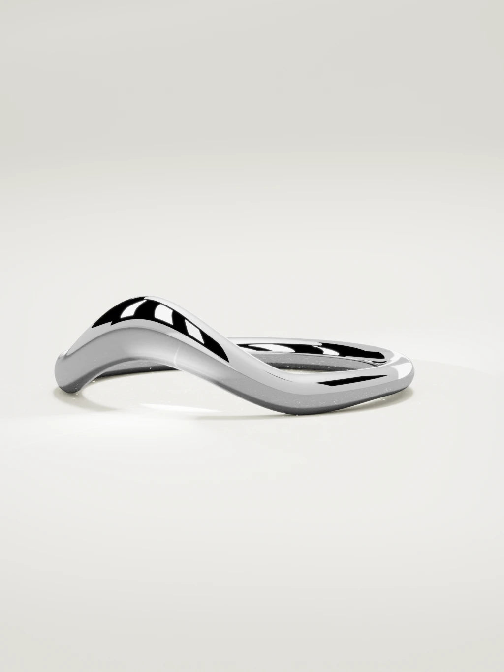 The Aria high contour wedding band in 14K white gold, three-quarter view