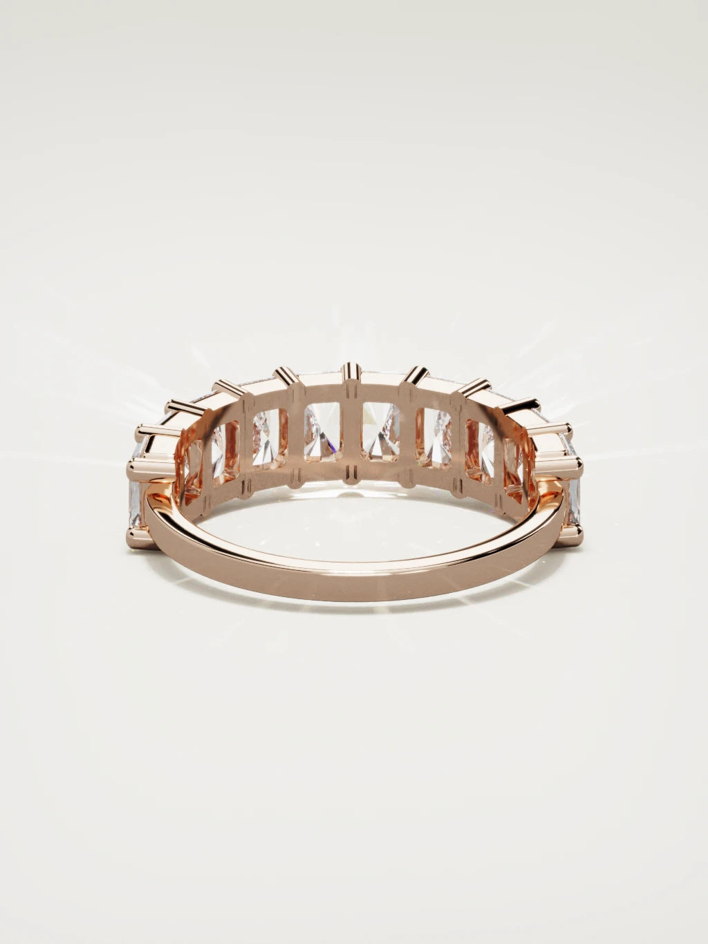 The Astra large prong radiant-cut half eternity band in 14K rose gold, back view