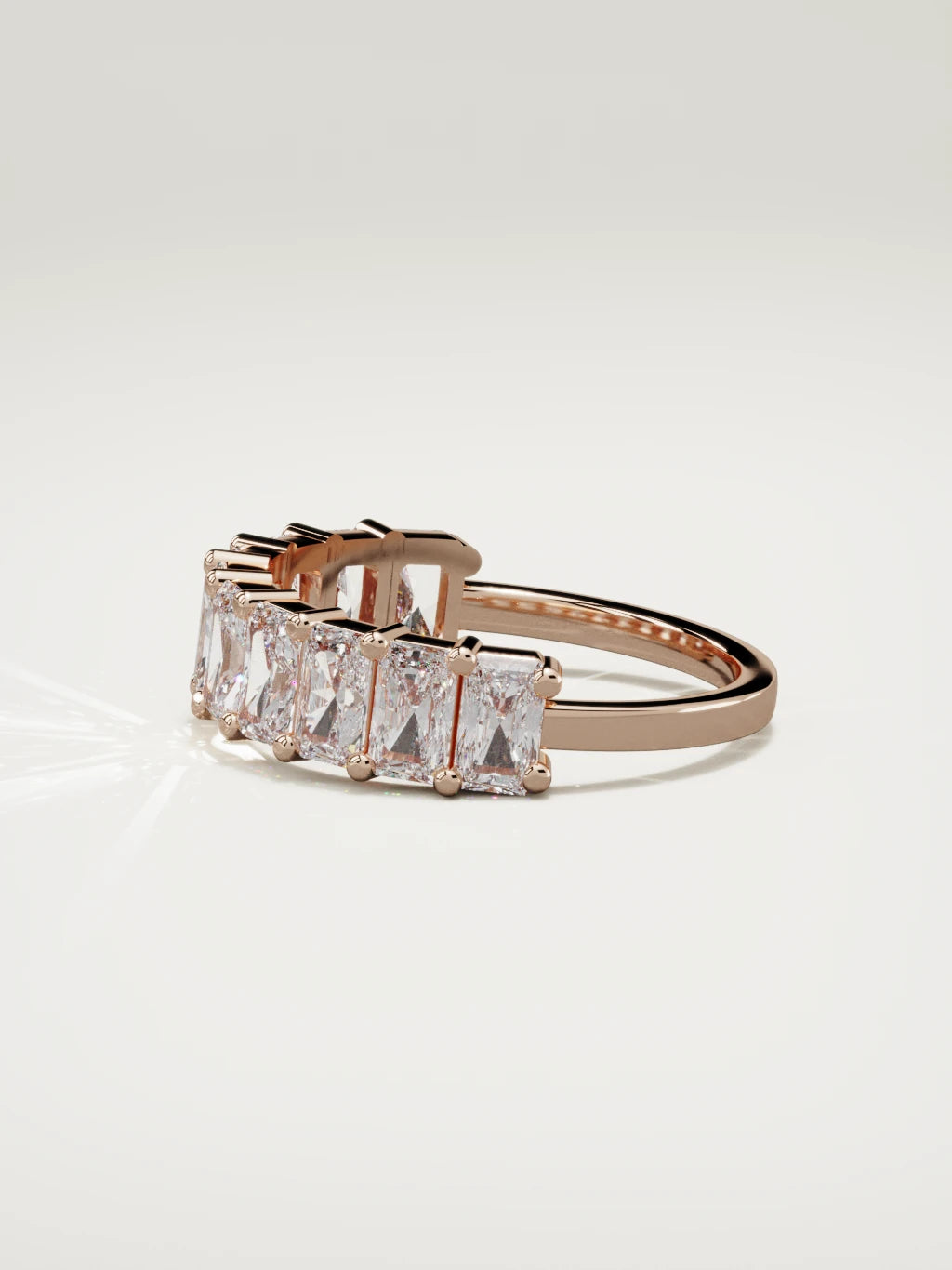 The Astra large prong radiant-cut half eternity band in 14K rose gold, side view