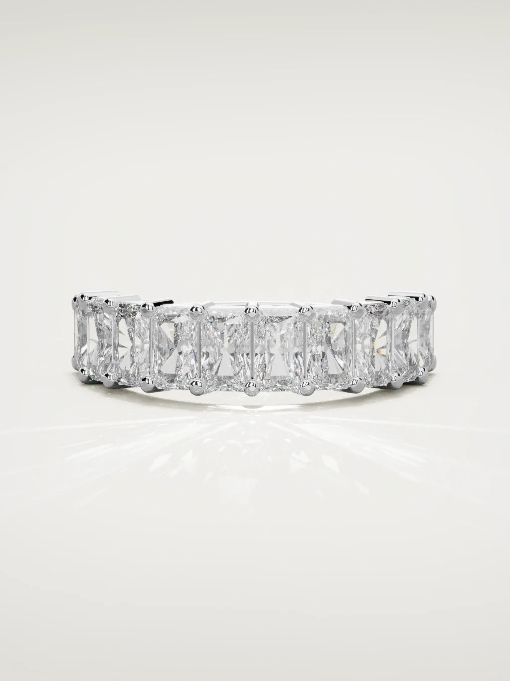 The Astra large prong radiant-cut half eternity band in 14K white gold, front view