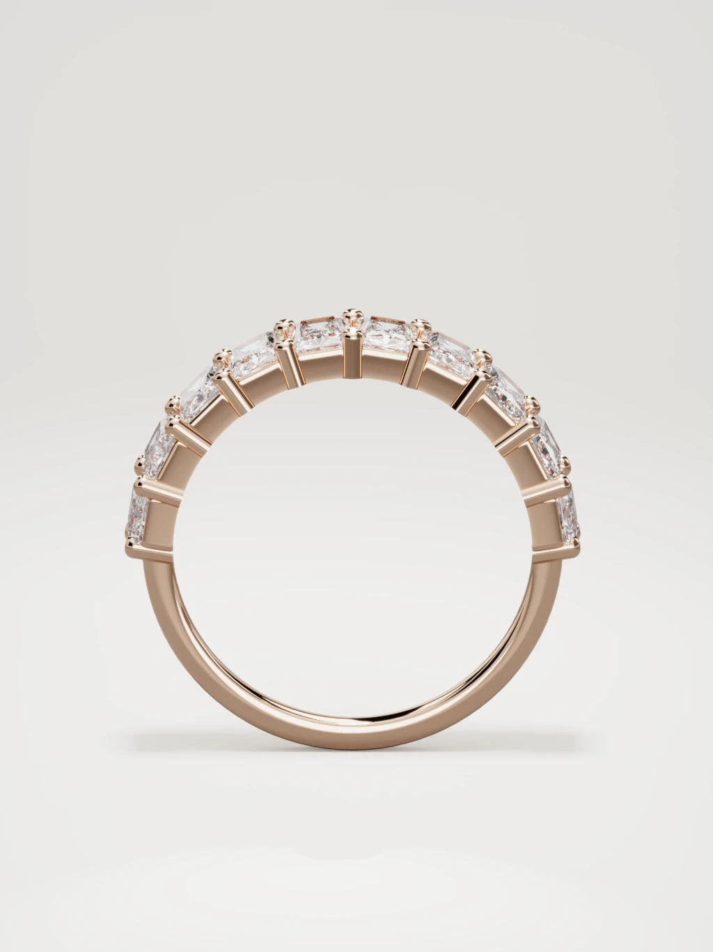 The Astra large prong radiant-cut half eternity band in 14K rose gold, standing front view