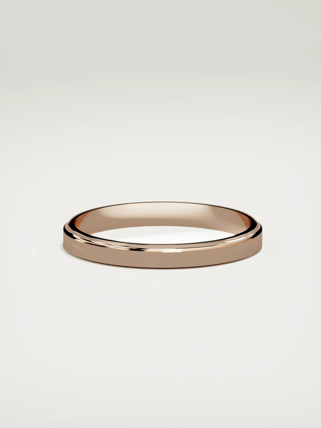 The Marco beveled-edge men's wedding band in 14K rose gold, 3 mm, side view