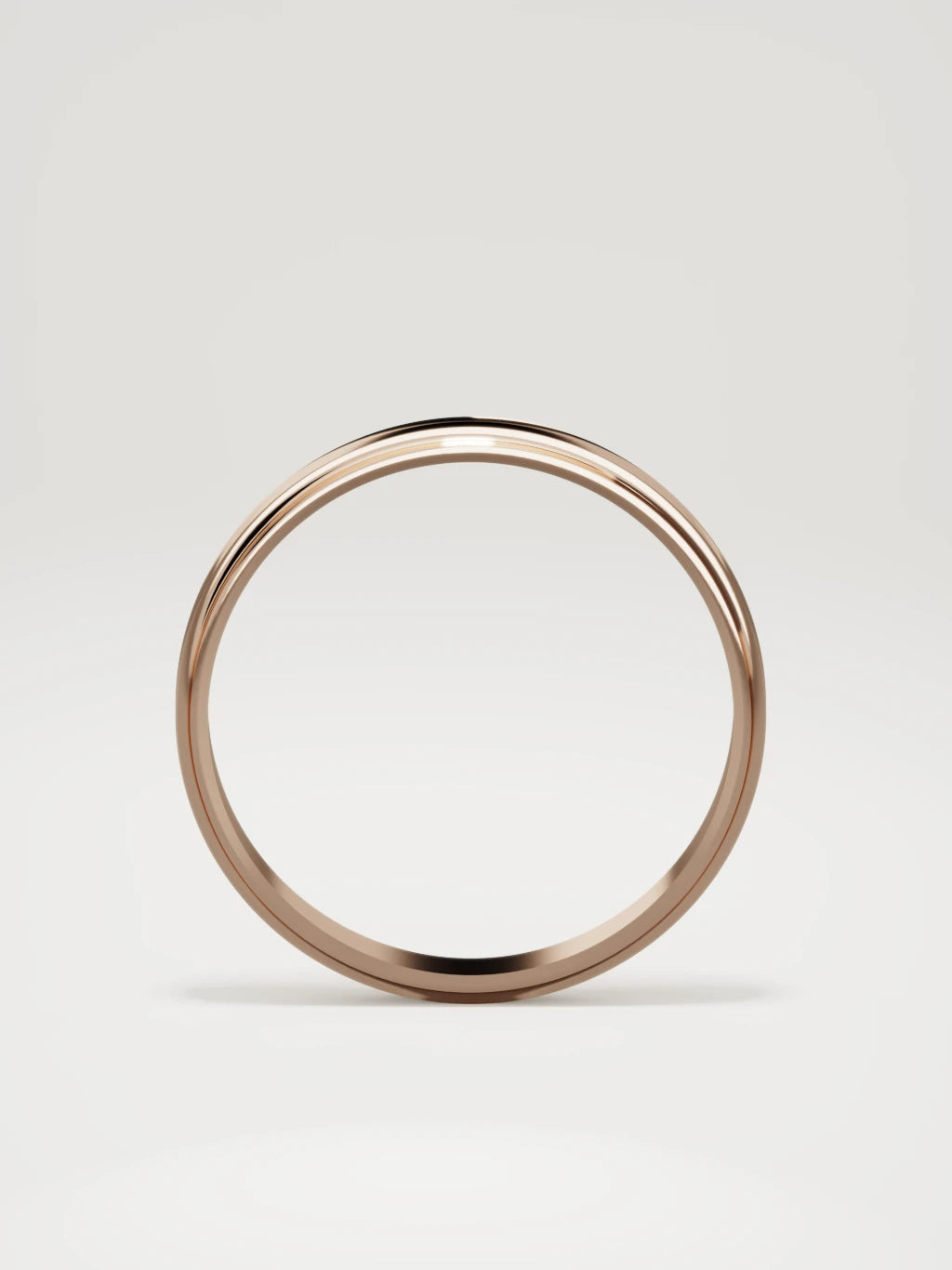 The Marco beveled-edge men's wedding band in 14K rose gold, 3 mm, standing front view