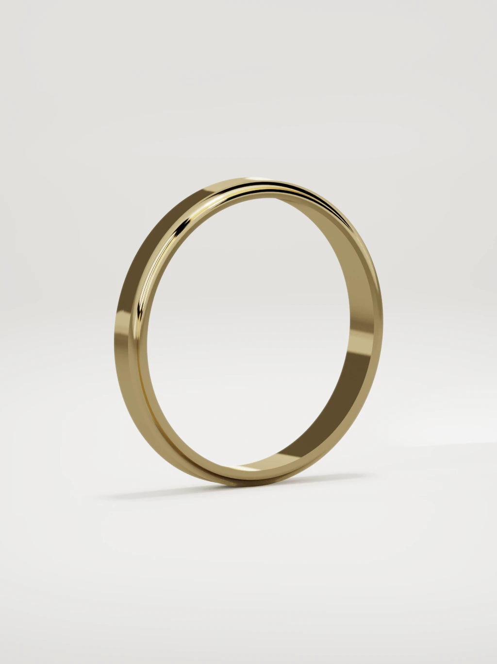 The Marco beveled-edge men's wedding band in 14K yellow gold, 3 mm, standing three-quarter view