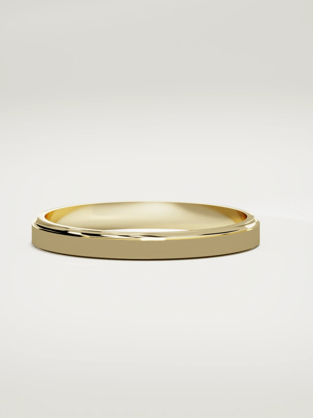 The Marco beveled-edge men's wedding band in 14K yellow gold, 3 mm, three-quarter view