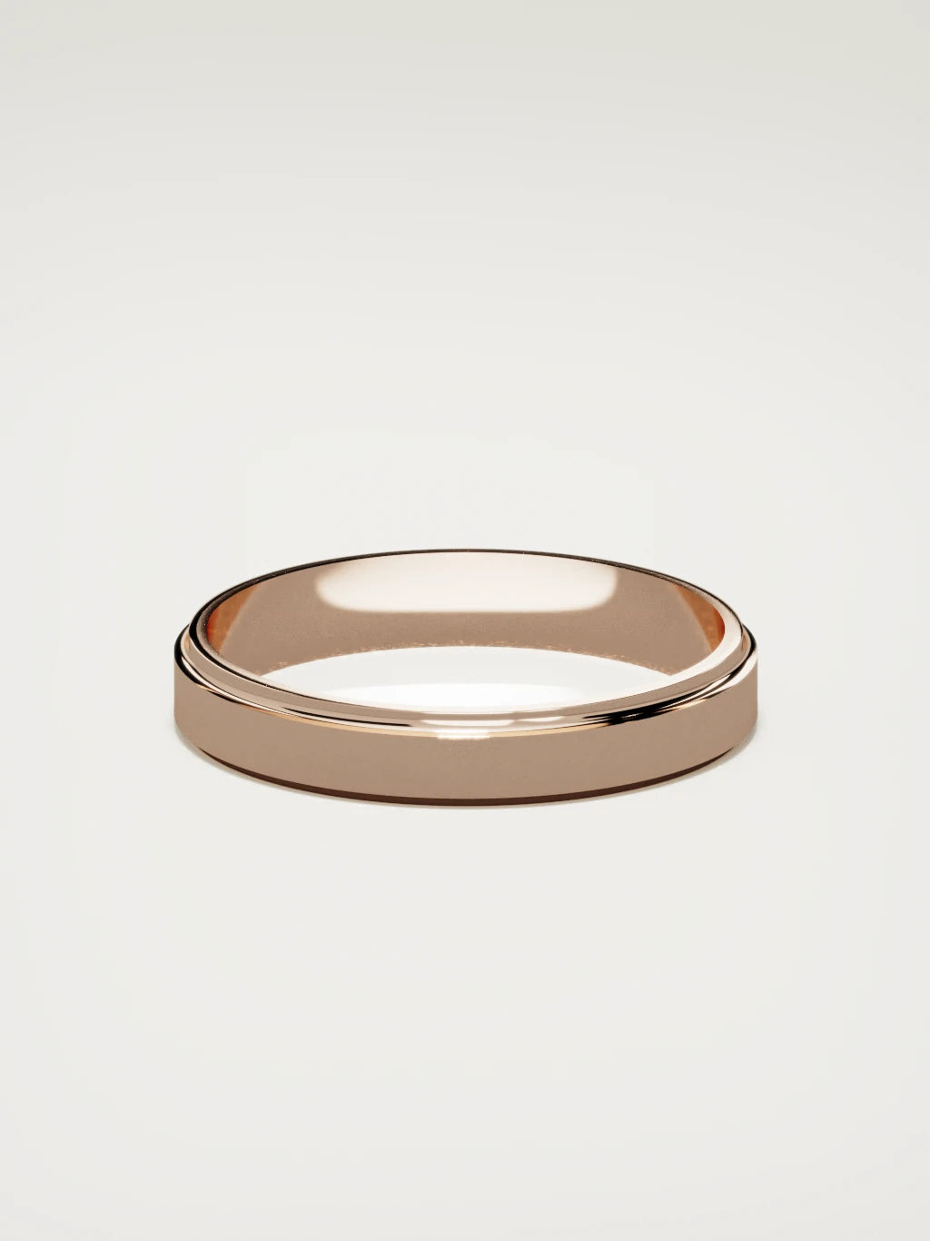 The Marco beveled-edge men's wedding band in 14K rose gold, 4 mm, back view