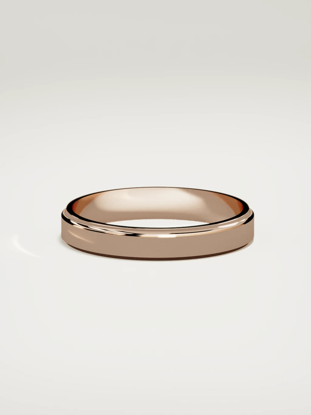 The Marco beveled-edge men's wedding band in 14K rose gold, 4 mm, side view