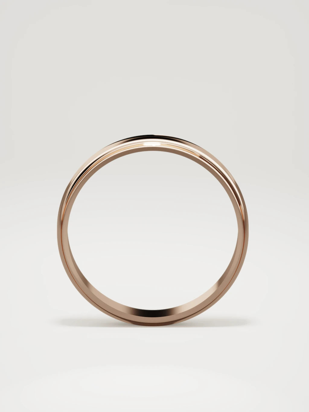 The Marco beveled-edge men's wedding band in 14K rose gold, 4 mm, standing front view