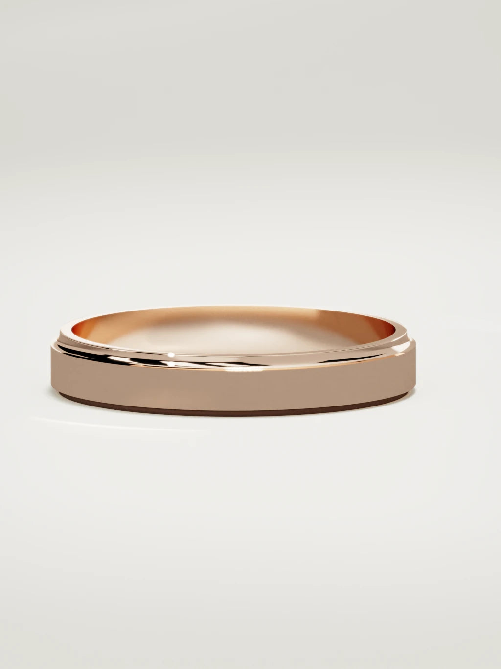 The Marco beveled-edge men's wedding band in 14K rose gold, 4 mm, three-quarter view
