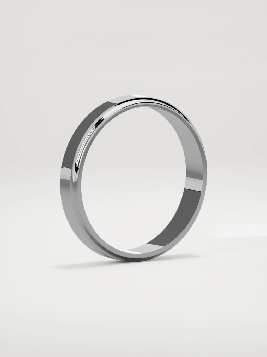 The Marco beveled-edge men's wedding band in 14K white gold, 4 mm, standing three-quarter view