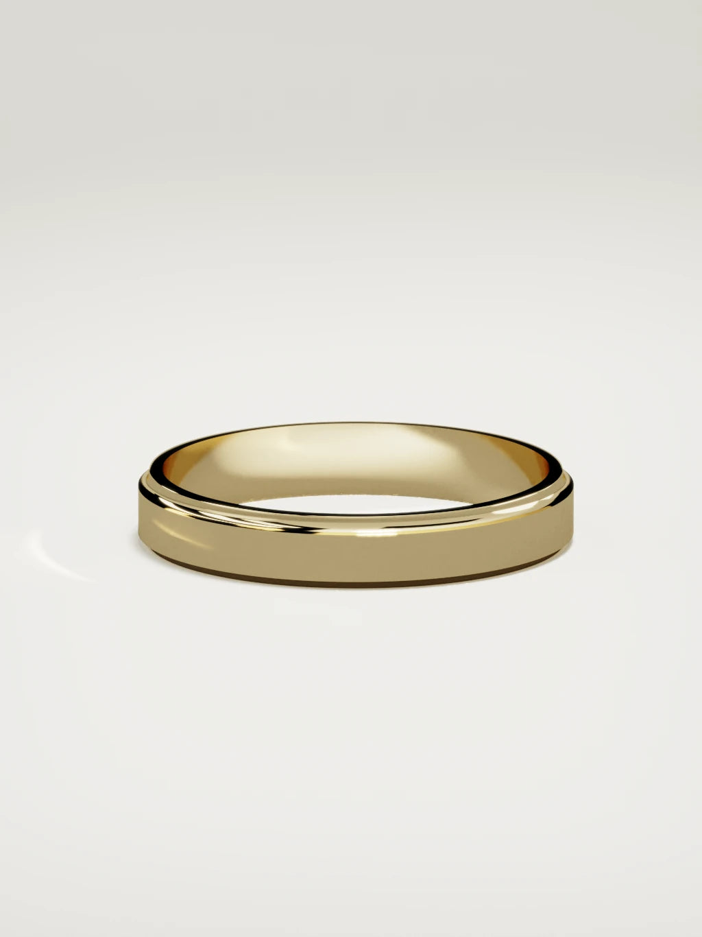 The Marco beveled-edge men's wedding band in 14K yellow gold, 4 mm, side view