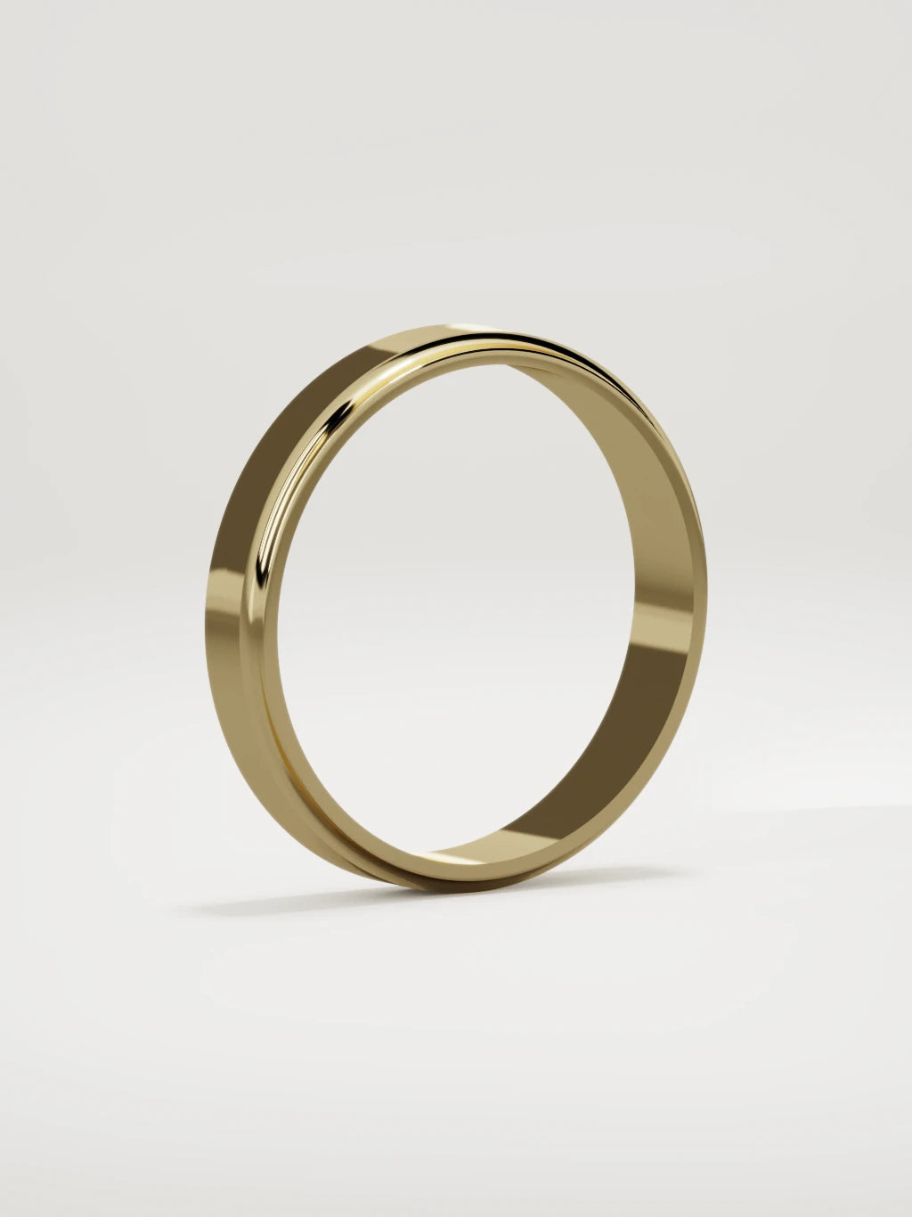 The Marco beveled-edge men's wedding band in 14K yellow gold, 4 mm, standing three-quarter view