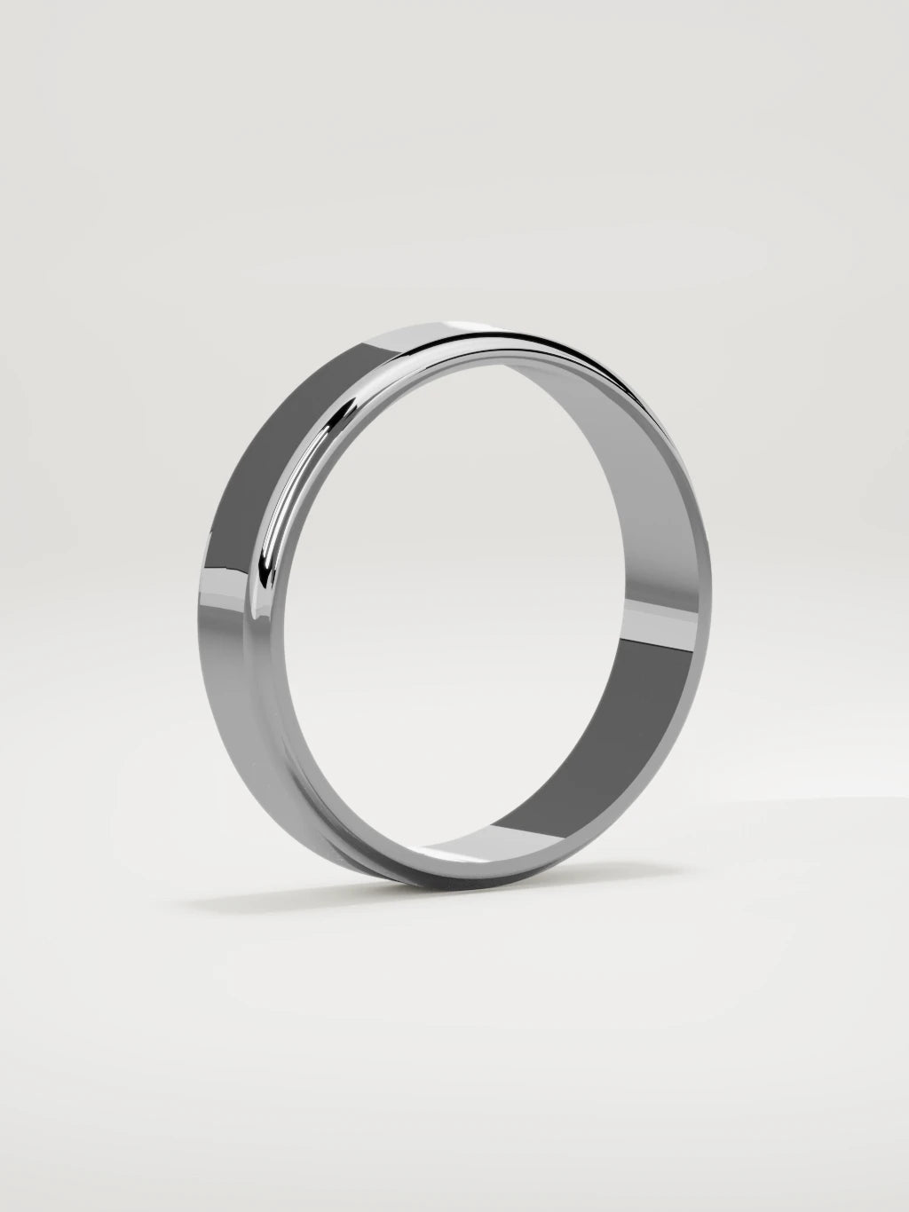 The Marco beveled-edge men's wedding band in 14K white gold, 5 mm, standing three-quarter view