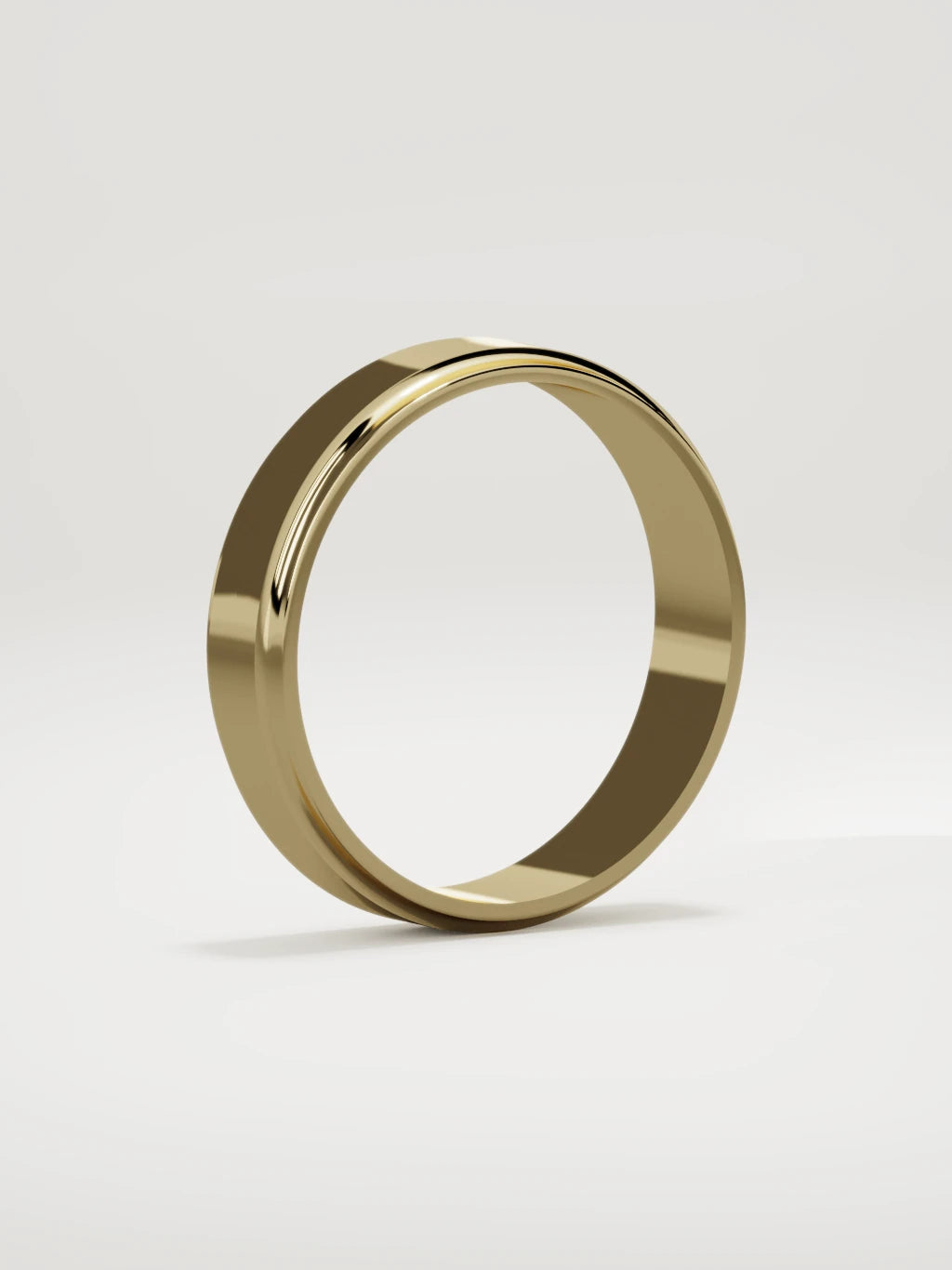 The Marco beveled-edge men's wedding band in 14K yellow gold, 5 mm, standing three-quarter view
