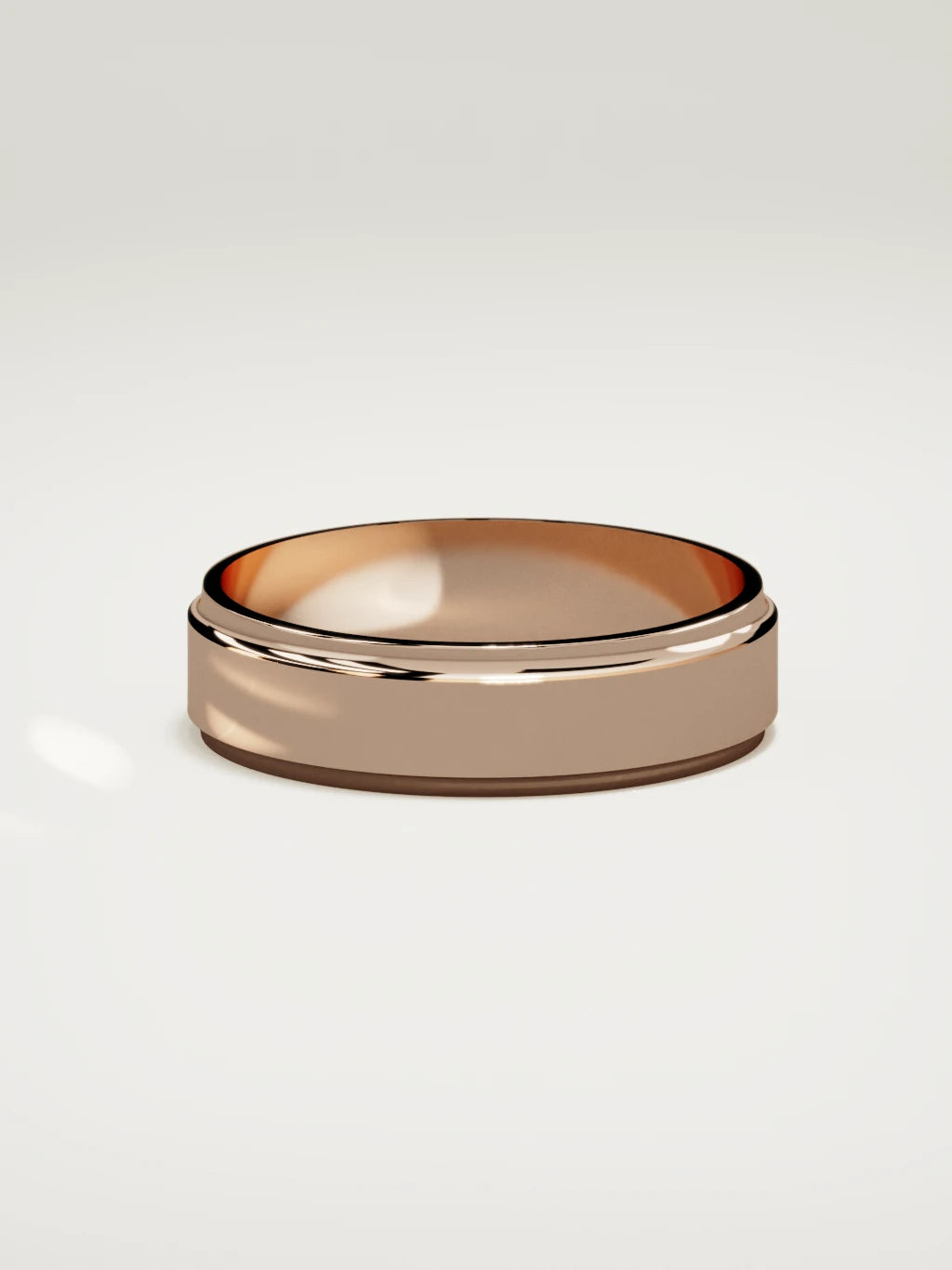The Marco beveled-edge men's wedding band in 14K rose gold, 6 mm, side view