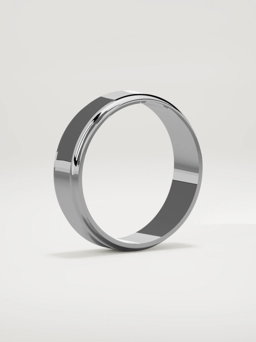 The Marco beveled-edge men's wedding band in 14K white gold, 6 mm, standing three-quarter view