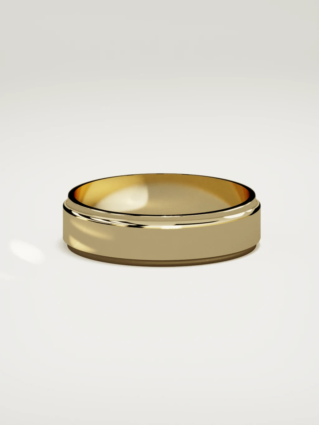 The Marco beveled-edge men's wedding band in 14K yellow gold, 6 mm, side view