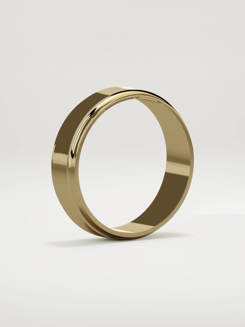 The Marco beveled-edge men's wedding band in 14K yellow gold, 6 mm, standing three-quarter view
