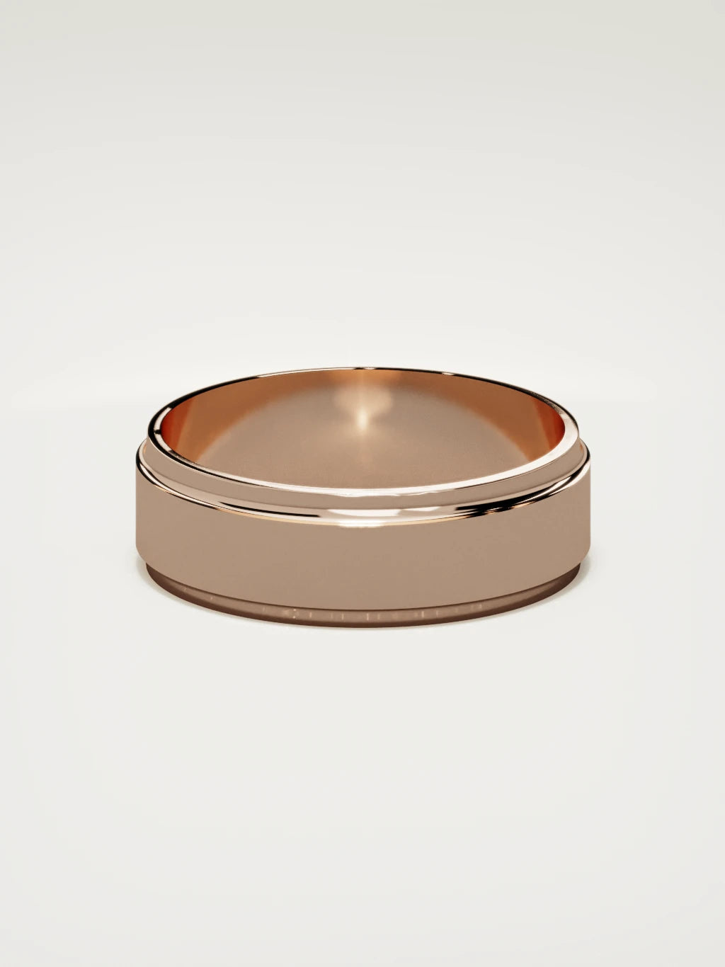 The Marco beveled-edge men's wedding band in 14K rose gold, 7 mm, back view