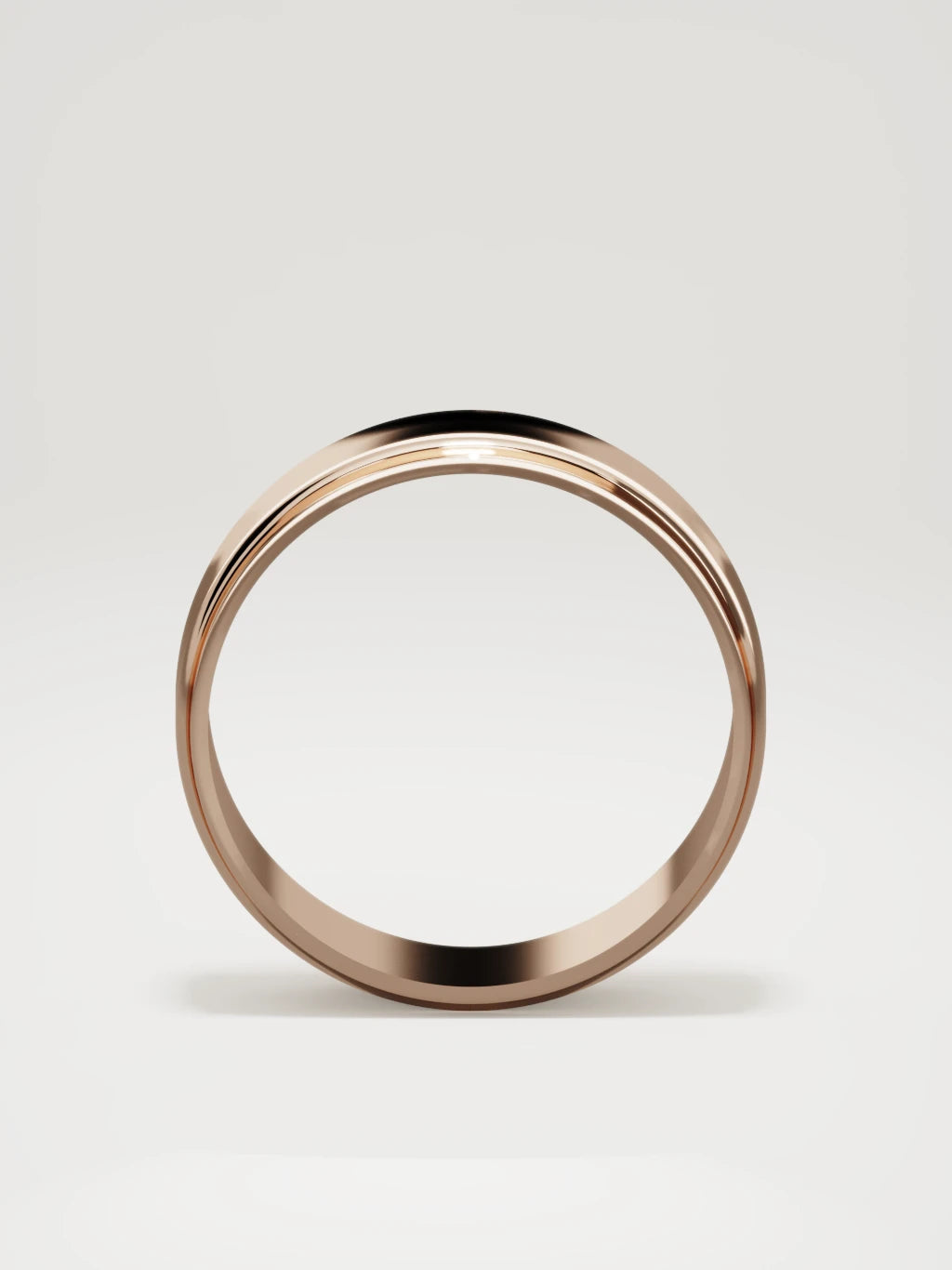 The Marco beveled-edge men's wedding band in 14K rose gold, 7 mm, standing front view