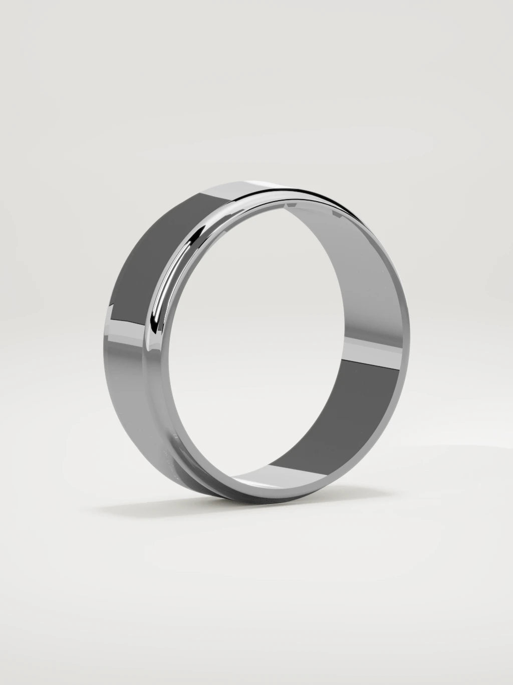 The Marco beveled-edge men's wedding band in 14K white gold, 7 mm, standing three-quarter view