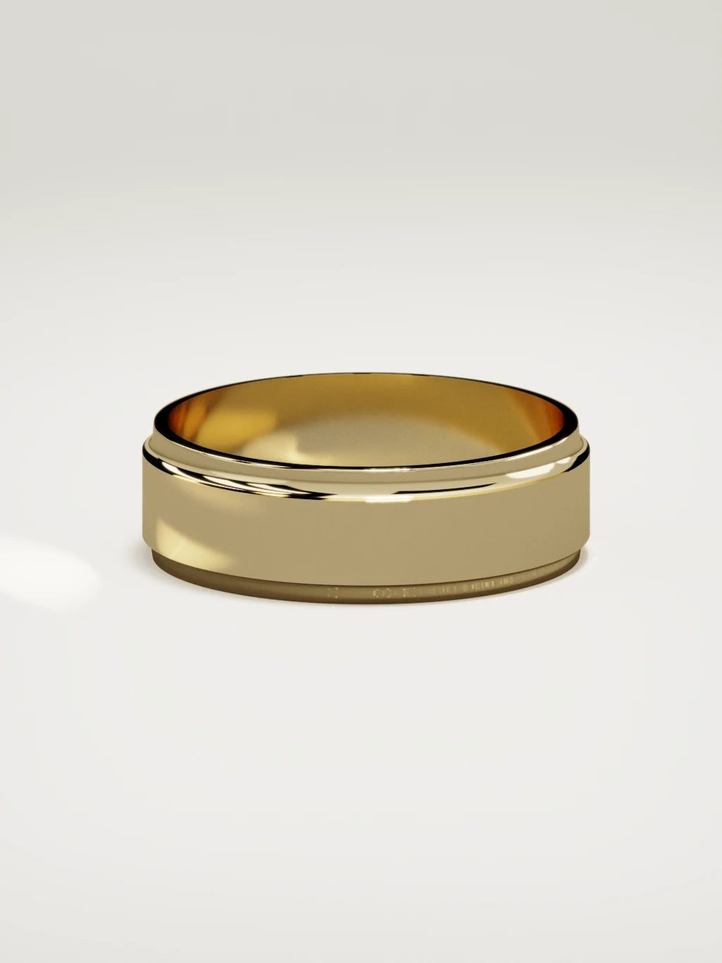 The Marco beveled-edge men's wedding band in 14K yellow gold, 7 mm, side view