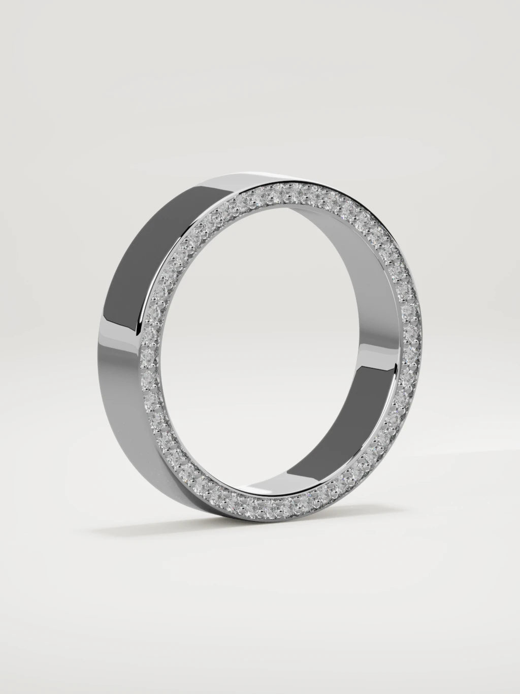 The Borde side pave men's wedding band in 14K white gold, 5 mm, standing three-quarter view