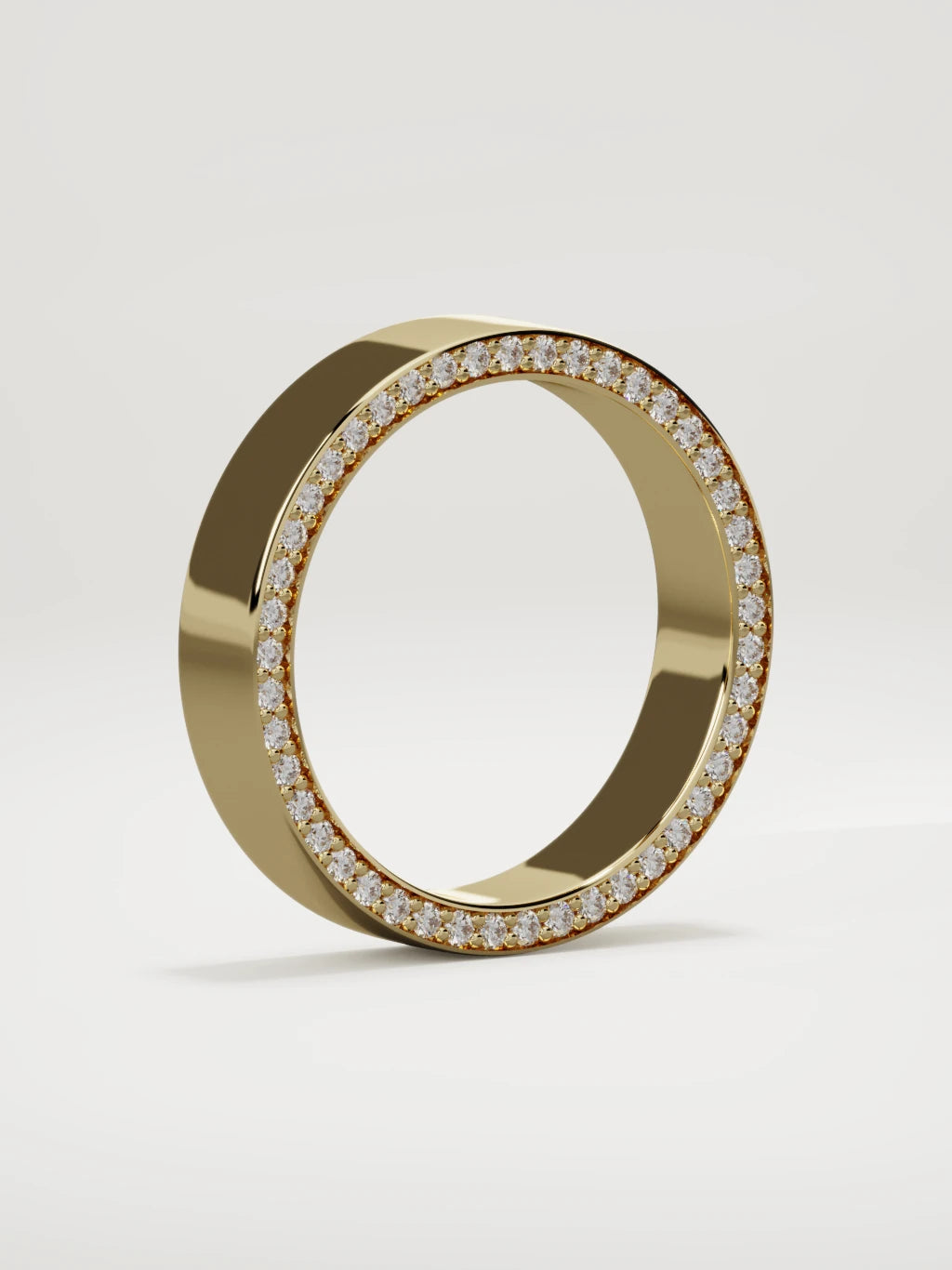 The Borde side pave men's wedding band in 14K yellow gold, 5 mm, standing three-quarter view