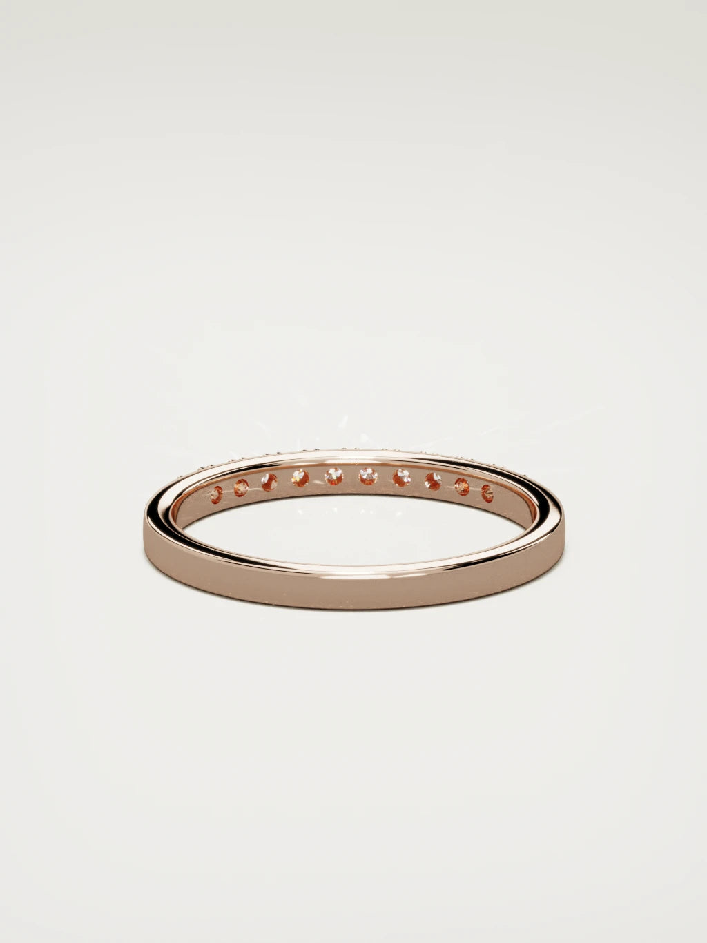 The Brisa petite half eternity band in 14K rose gold, back view