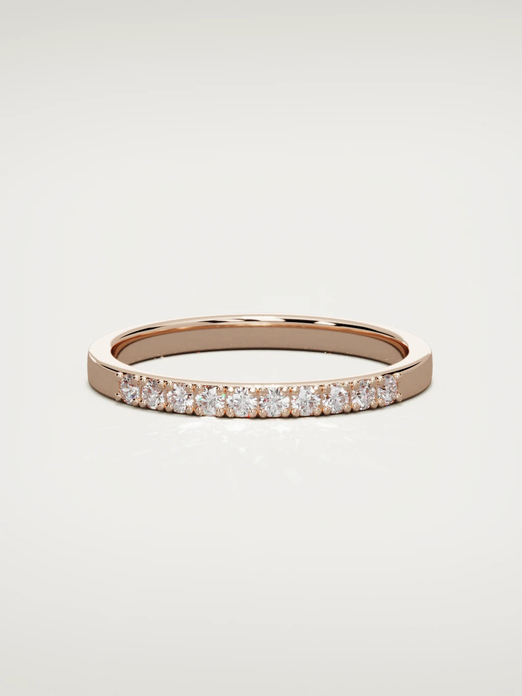The Brisa petite half eternity band in 14K rose gold, front view