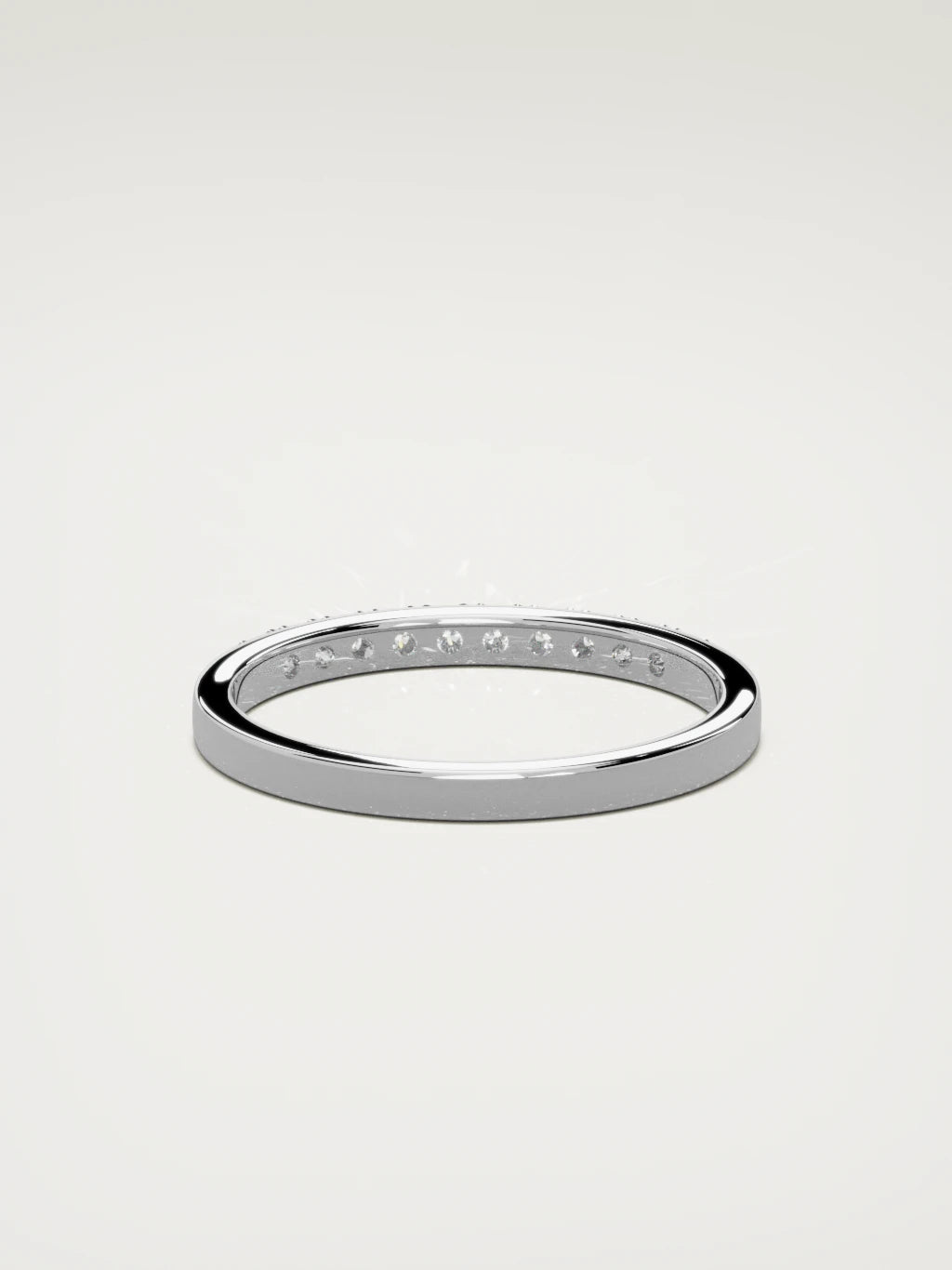The Brisa petite half eternity band in 14K white gold, back view