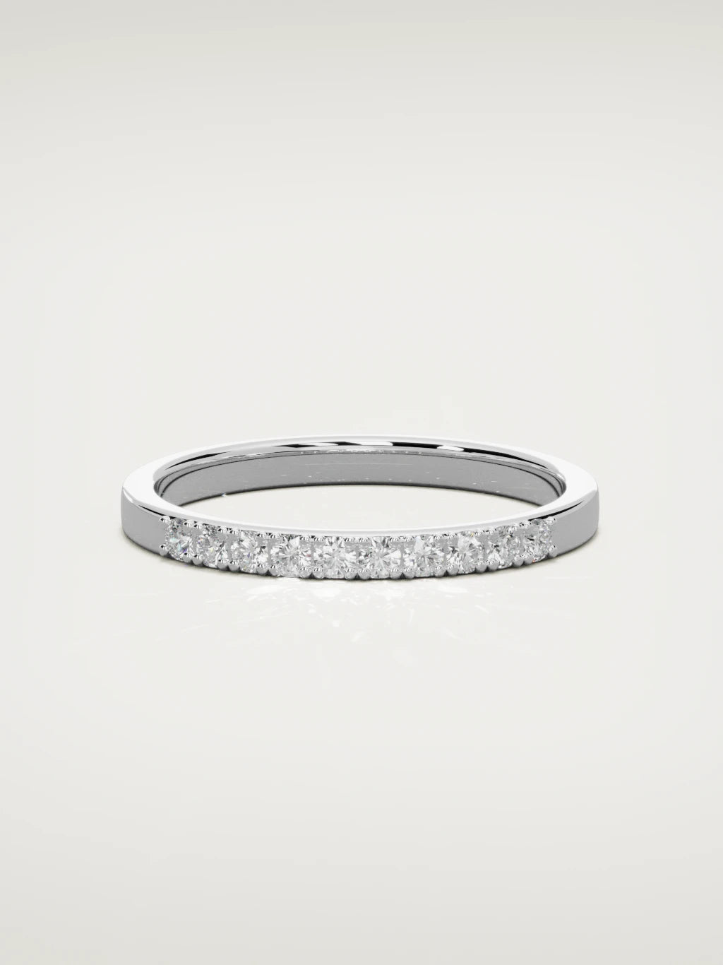 The Brisa petite half eternity band in 14K white gold, front view