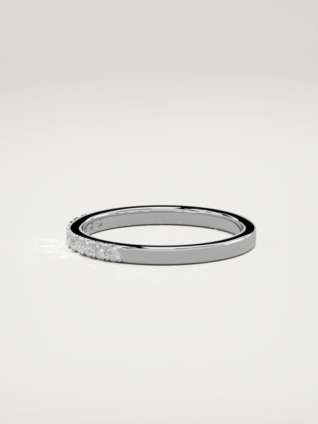 The Brisa petite half eternity band in 14K white gold, side view