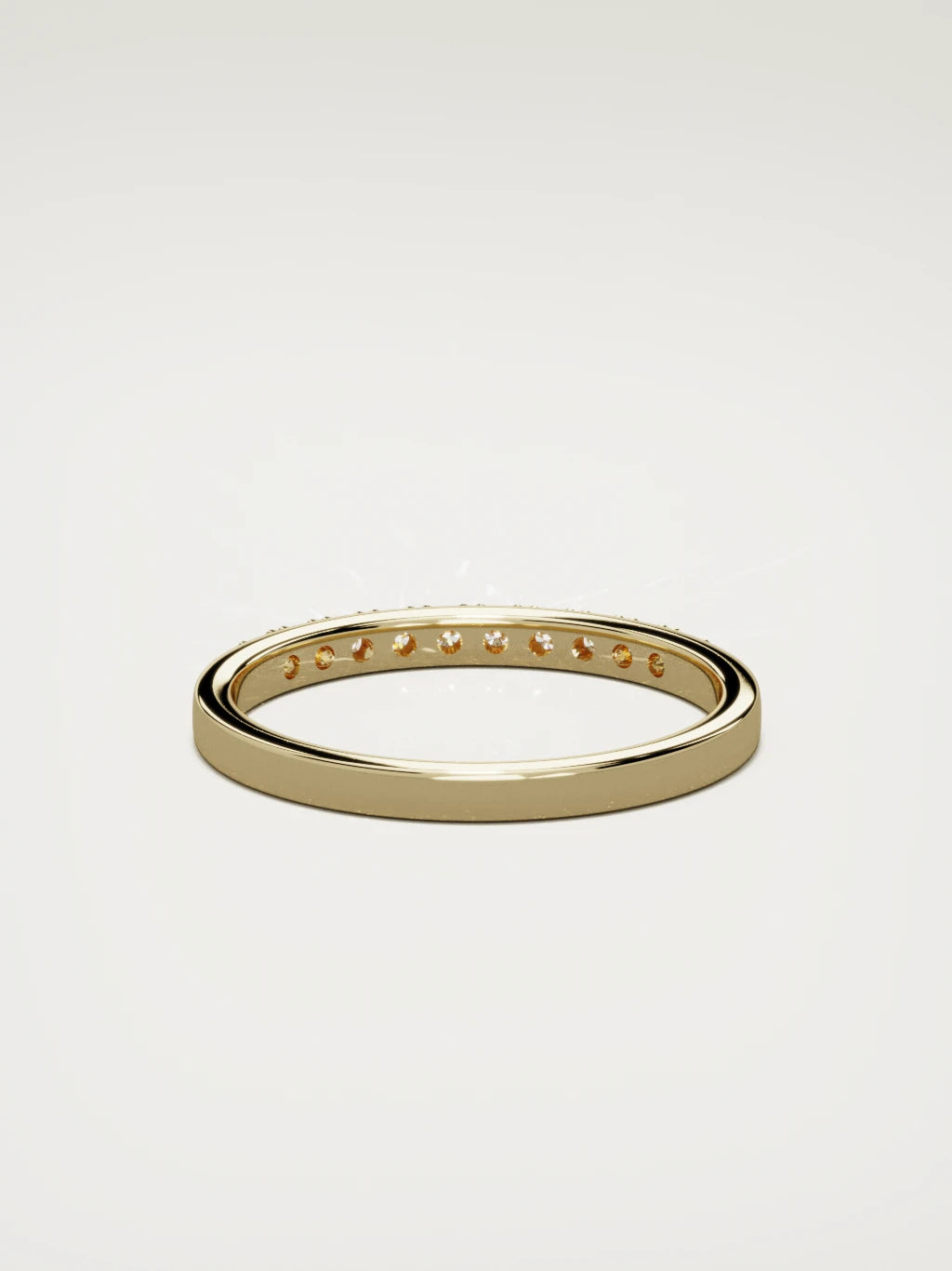 The Brisa petite half eternity band in 14K yellow gold, back view