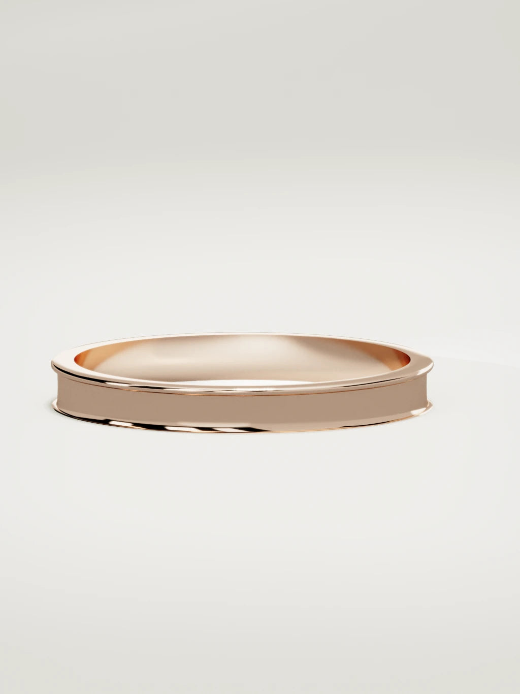 The Valle channel men's wedding band in 14K rose gold, 3 mm, three-quarter view